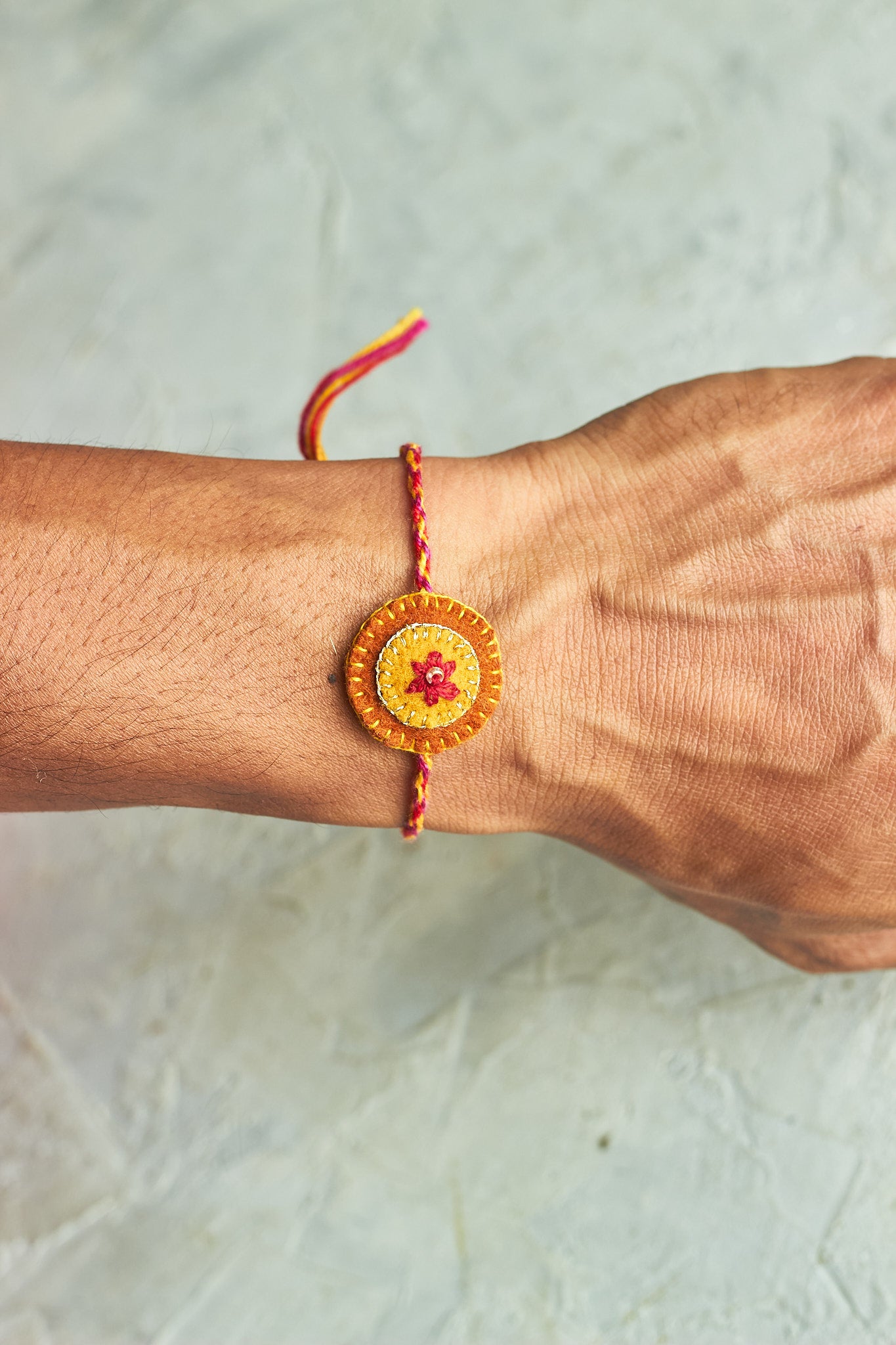 Sunshine Rakhi - Mahua Floral Studio