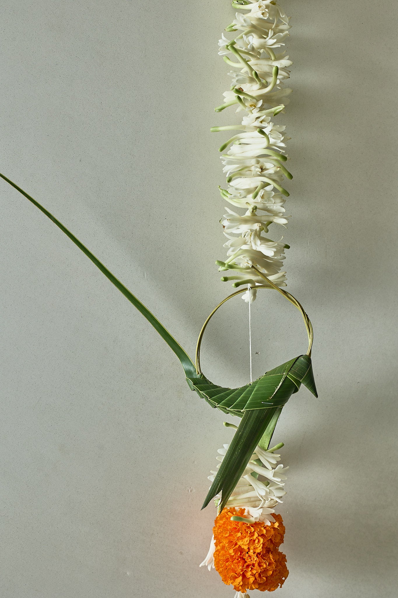 Tota & Tuberose Latkan - Mahua Floral Studio