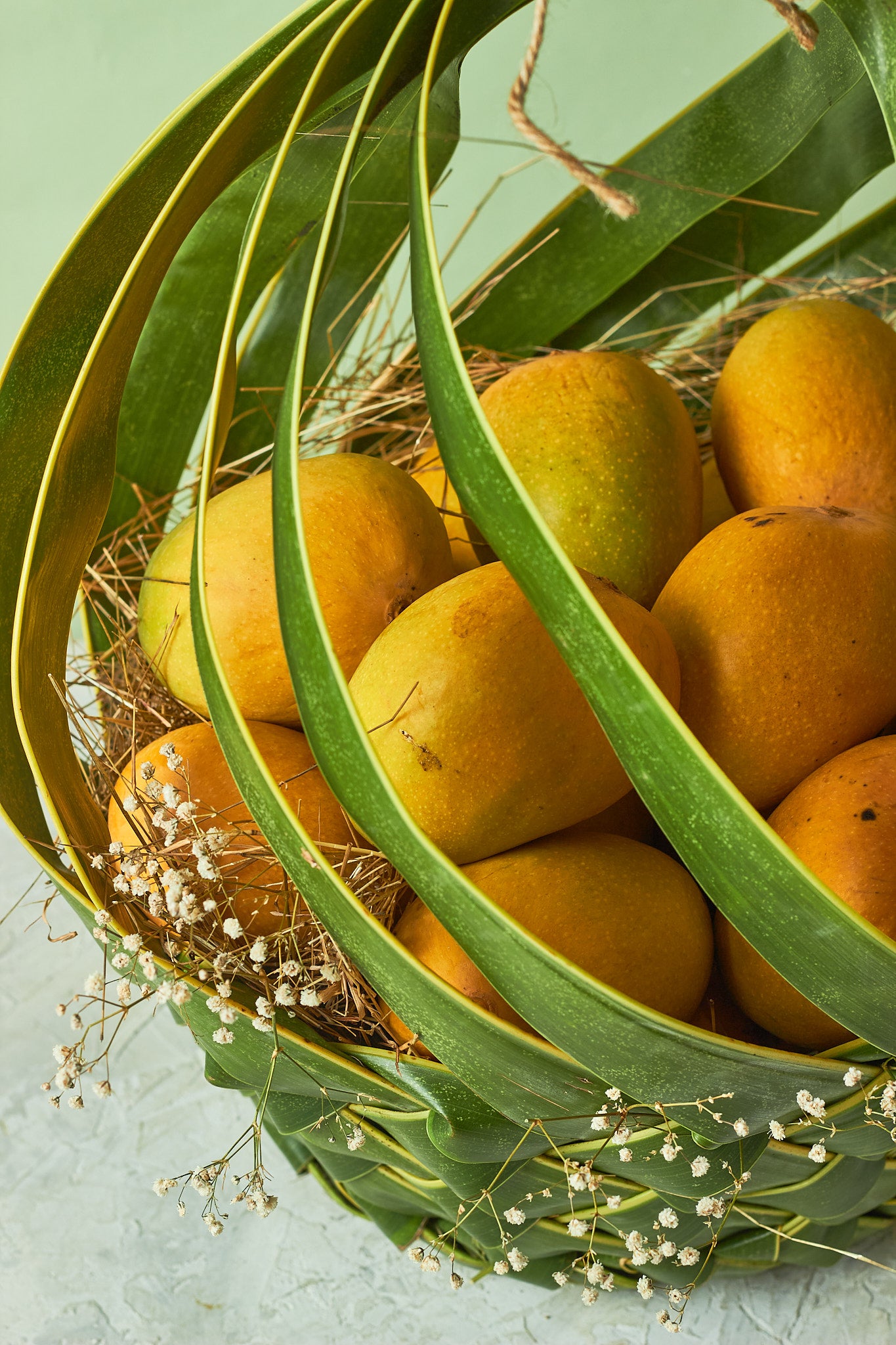 Buy Bow Mango Basket by  Mahua Floral Studio.