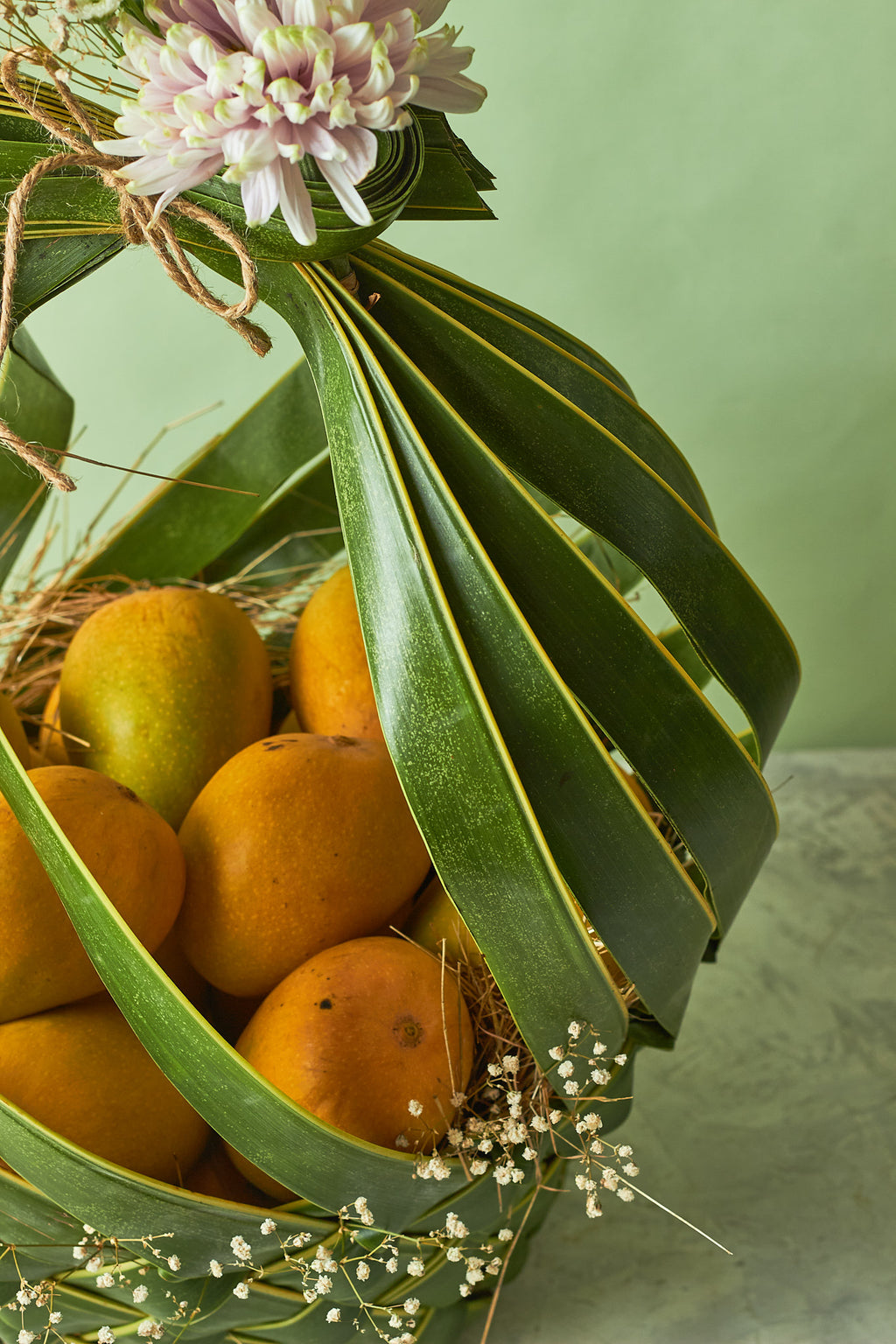 Buy Bow Mango Basket by  Mahua Floral Studio.