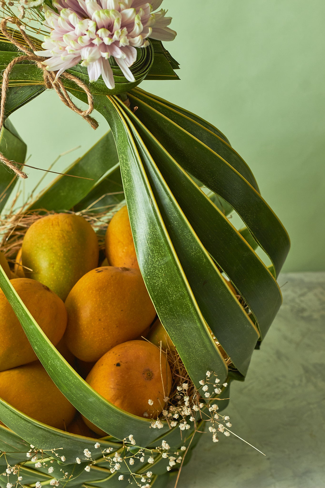 Buy Bow Mango Basket by  Mahua Floral Studio.