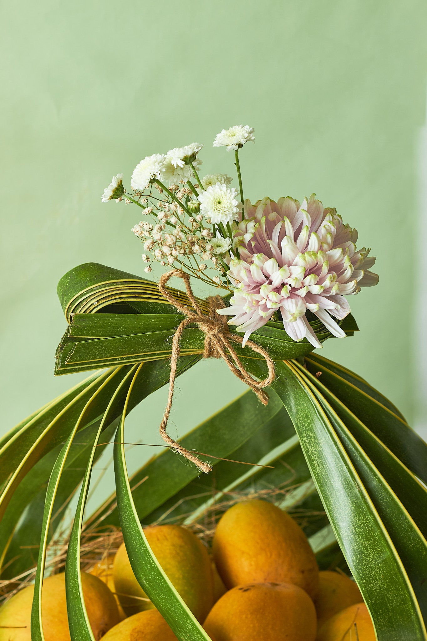 Buy Bow Mango Basket by  Mahua Floral Studio.