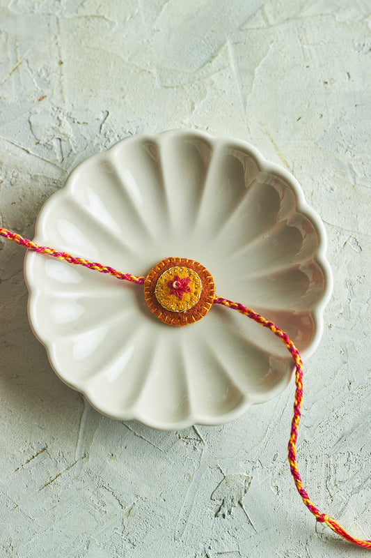 Sunshine Rakhi - Mahua Floral Studio