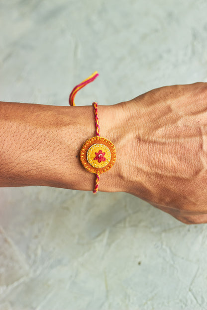 Sunshine Rakhi - Mahua Floral Studio