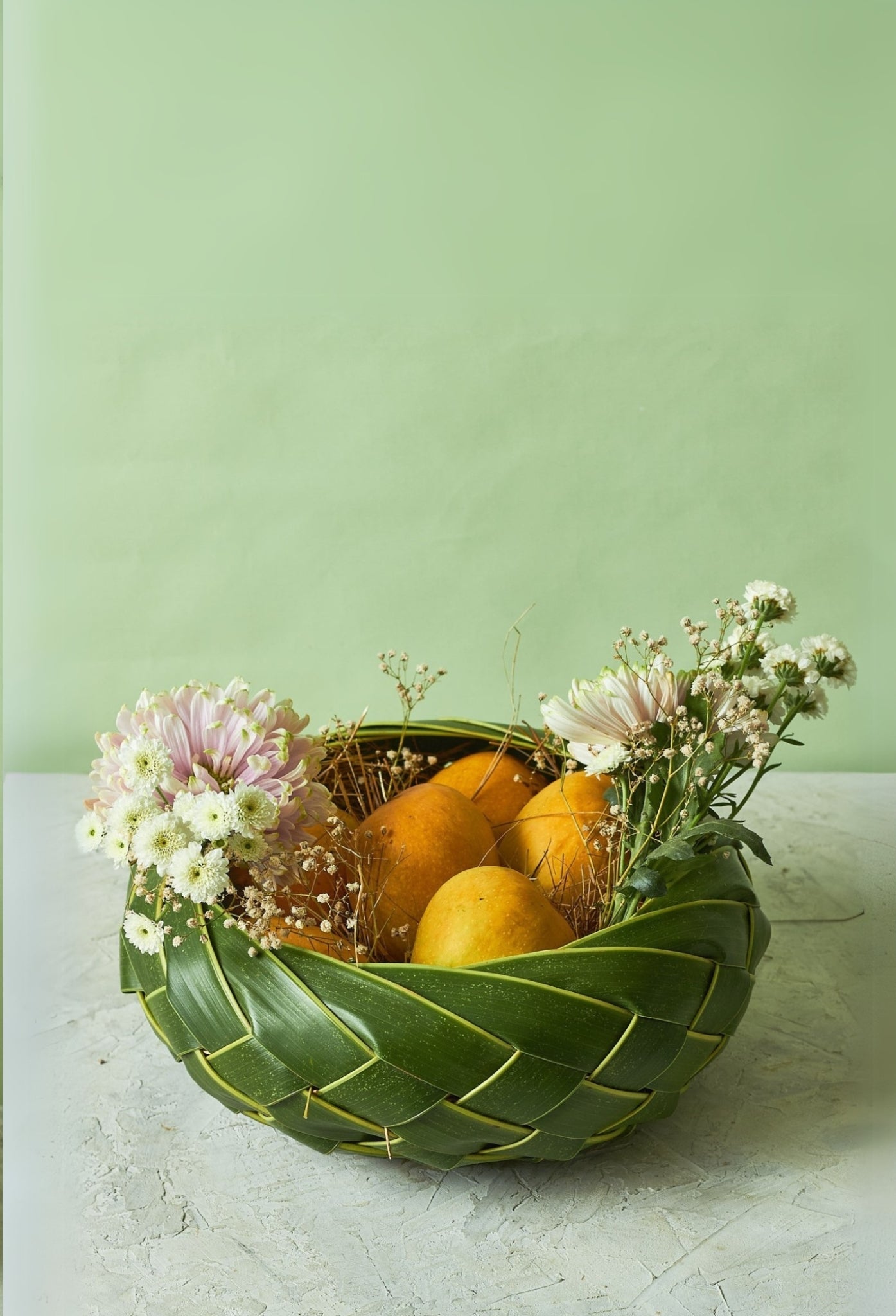 Buy The Petite Mango Basket by  Mahua Floral Studio.