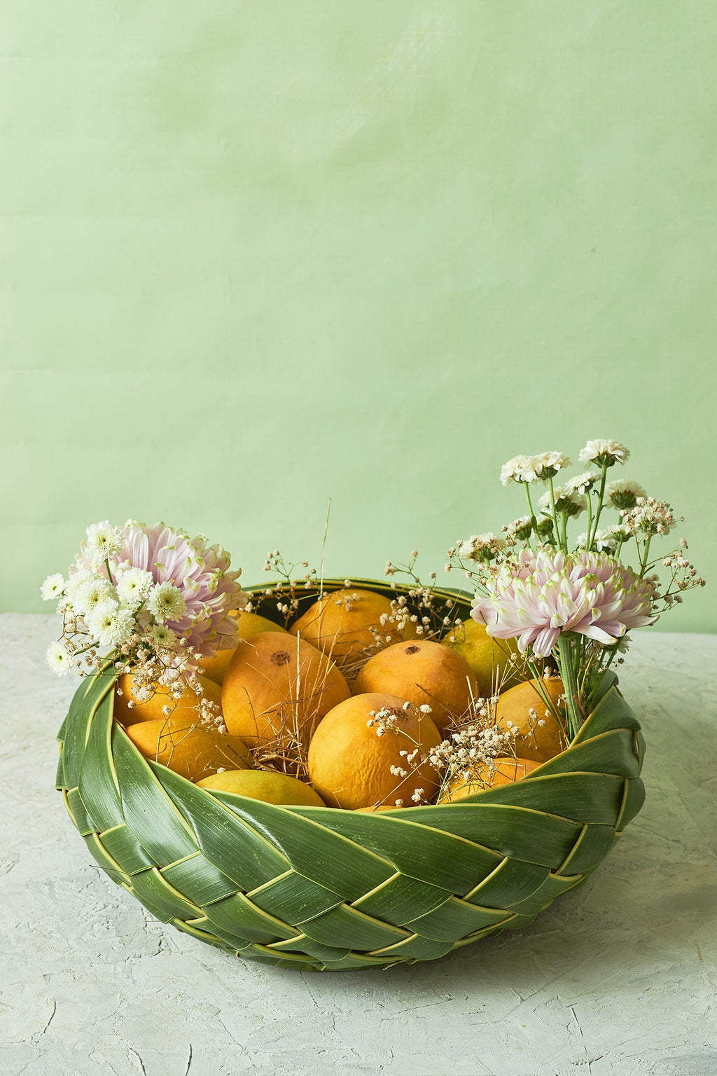 Buy The Classic Mango Basket by  Mahua Floral Studio.