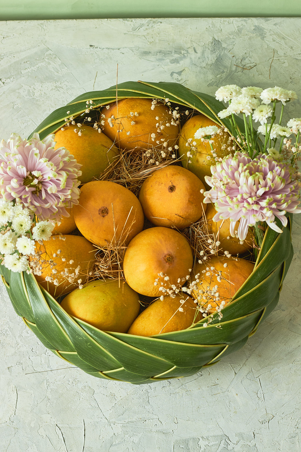 Buy The Classic Mango Basket by  Mahua Floral Studio.