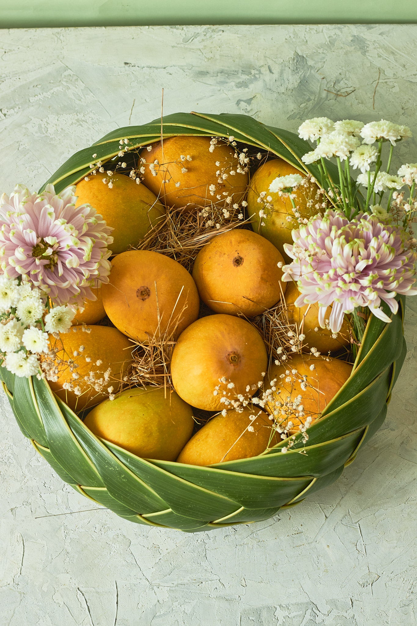 Buy The Classic Mango Basket by  Mahua Floral Studio.