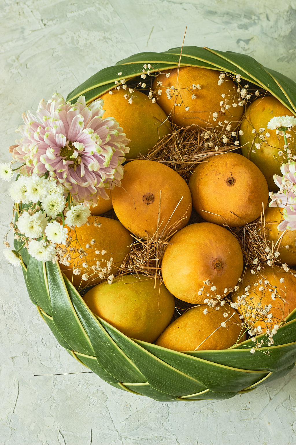 Buy The Classic Mango Basket by  Mahua Floral Studio.