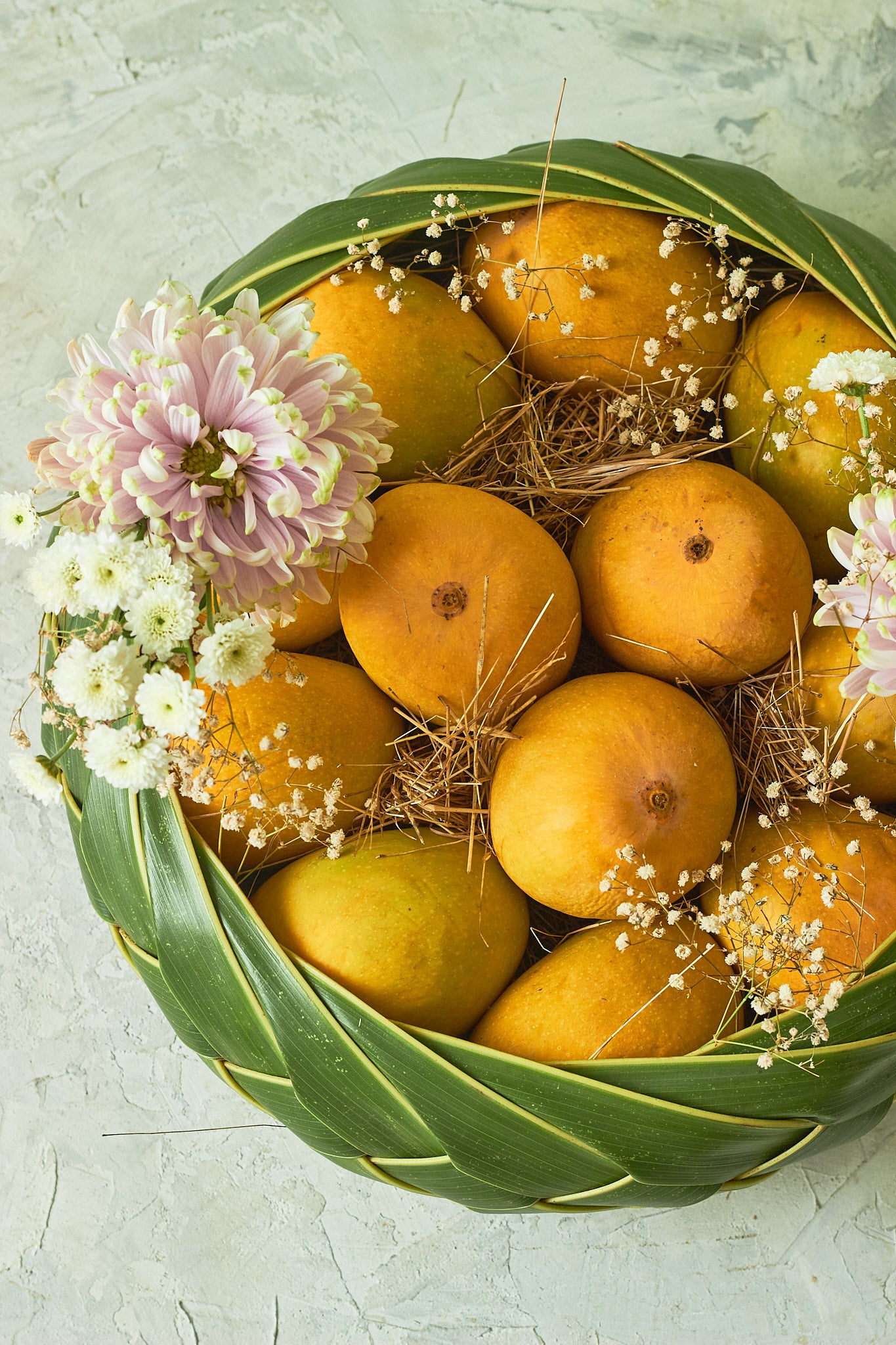 Buy The Classic Mango Basket by  Mahua Floral Studio.