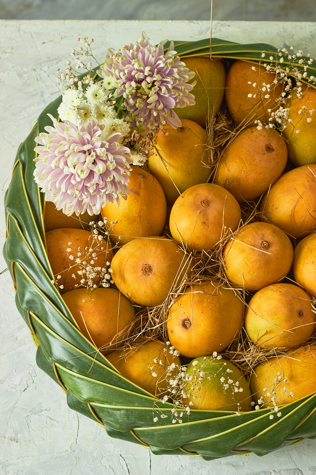 Buy The Grand Mango Basket by  Mahua Floral Studio.