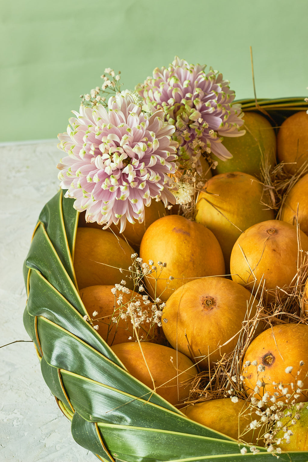 Buy The Grand Mango Basket by  Mahua Floral Studio.