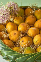 Buy The Grand Mango Basket by  Mahua Floral Studio.