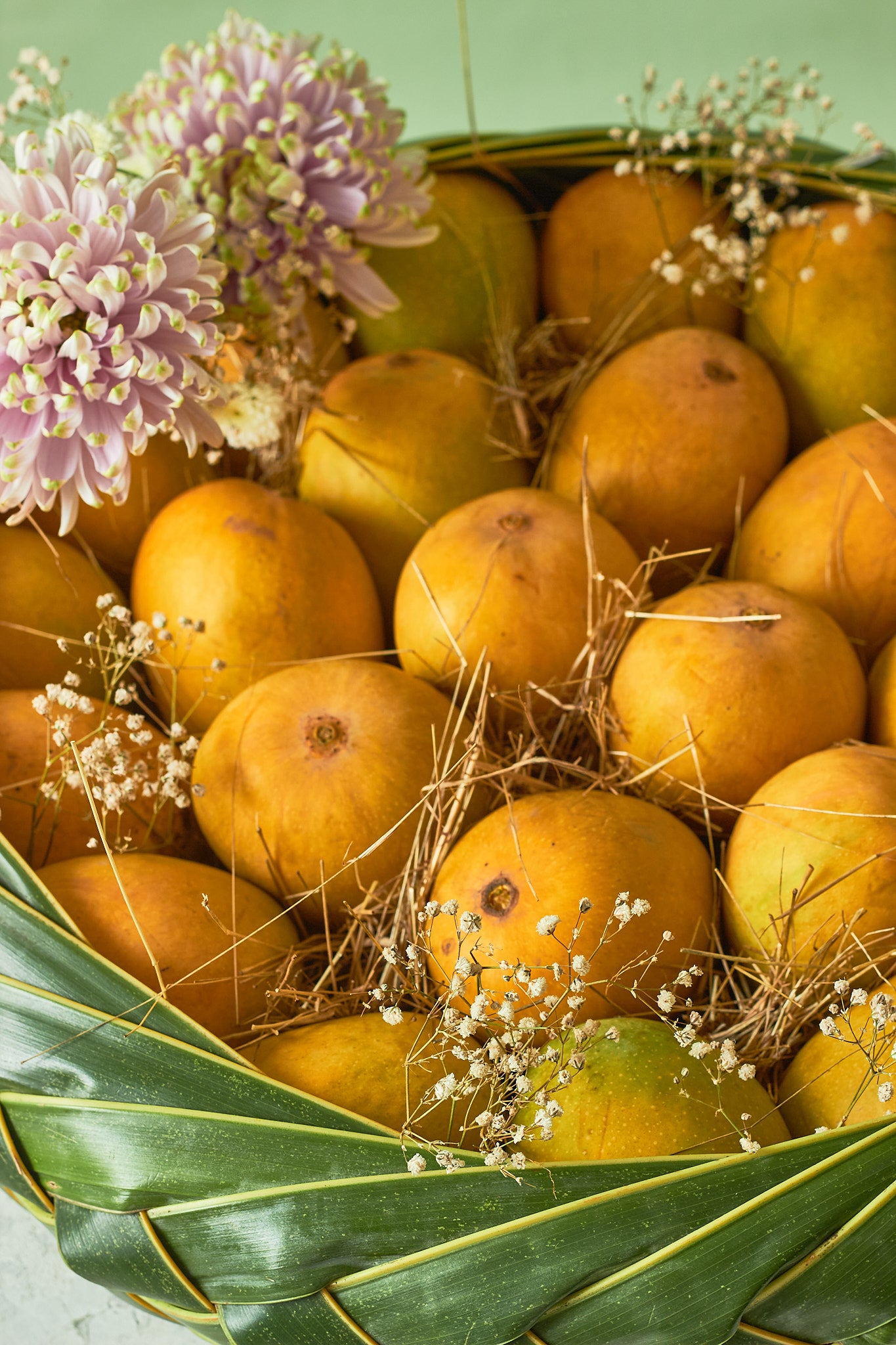 Buy The Grand Mango Basket by  Mahua Floral Studio.